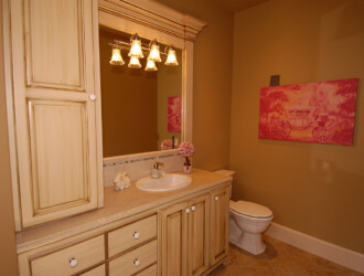 Cream colored wooden bathroom vanity